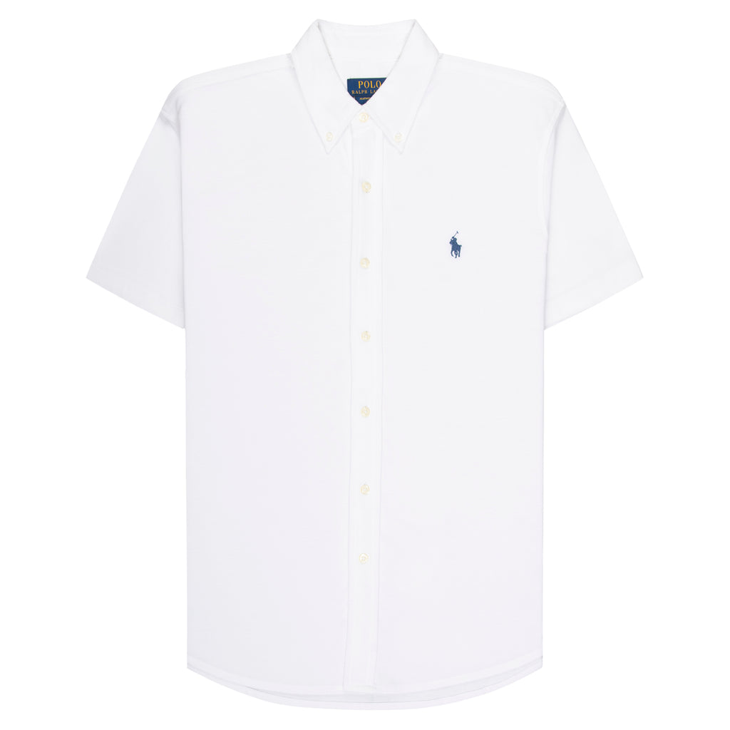 White polo shirt with a small logo on a white background