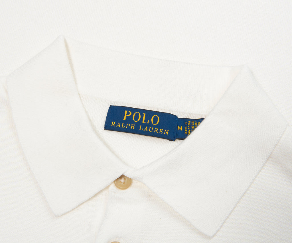 Close-up of a Polo Ralph Lauren shirt with a visible label on a white background