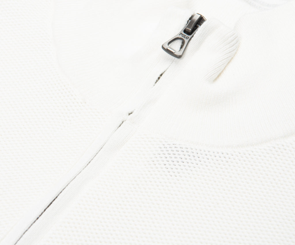 Close-up of a zipper on a white background