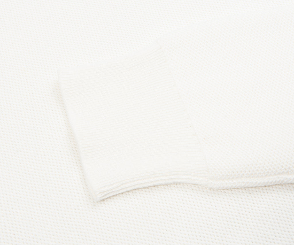 Close-up of a white textured fabric