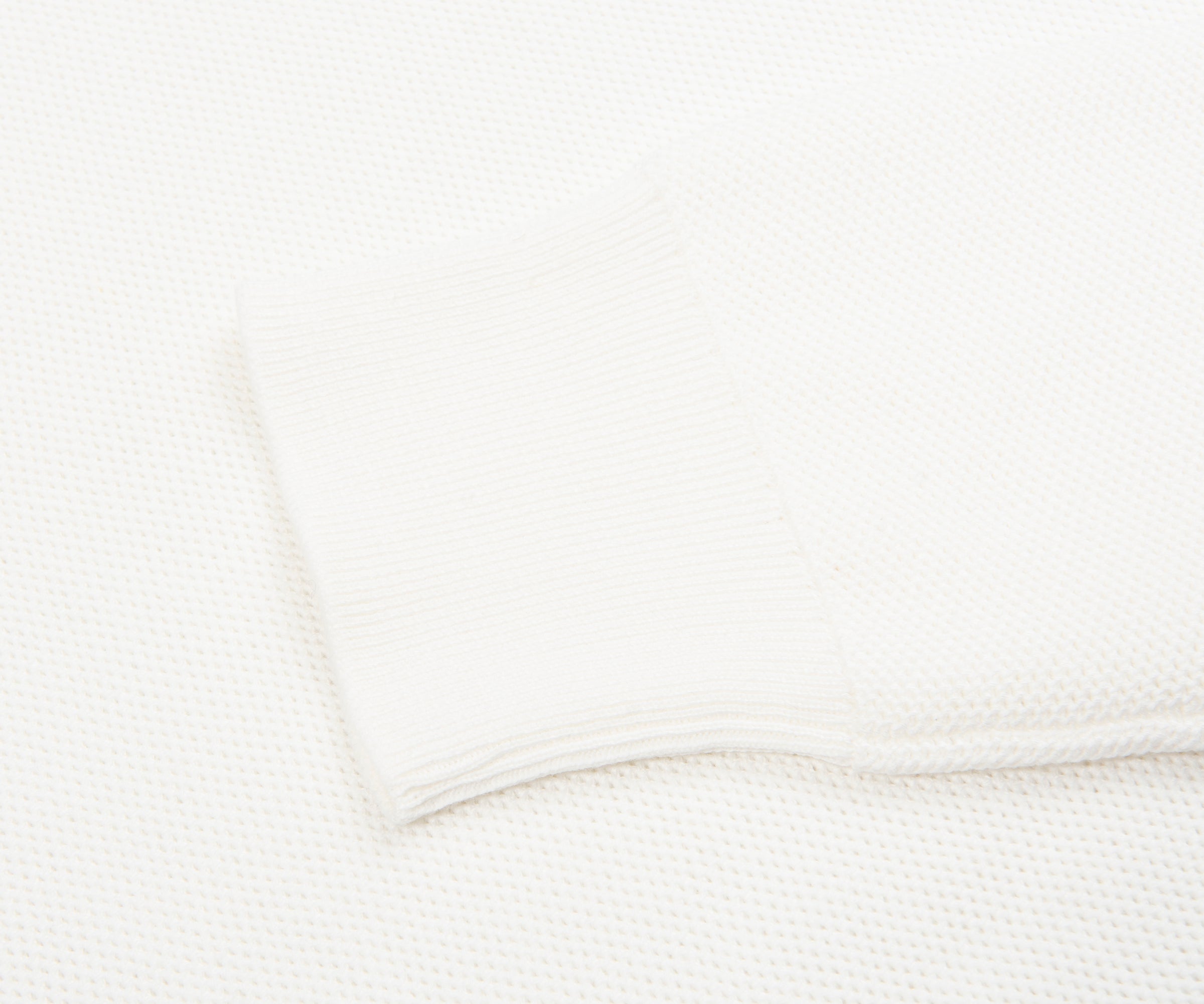 Close-up of a white textured fabric
