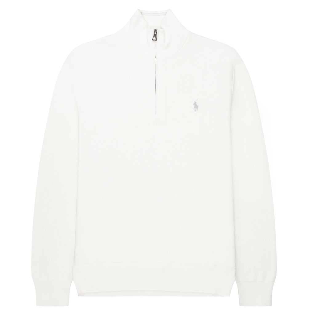 White long-sleeve shirt with a small logo on a white background