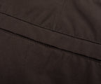 Close-up of a dark brown fabric texture