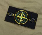 Stone Island patch on a green background