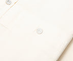 Close-up of a white envelope with a white background