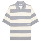 Gray and white striped polo shirt with 'Stevie Alan' label on a white background