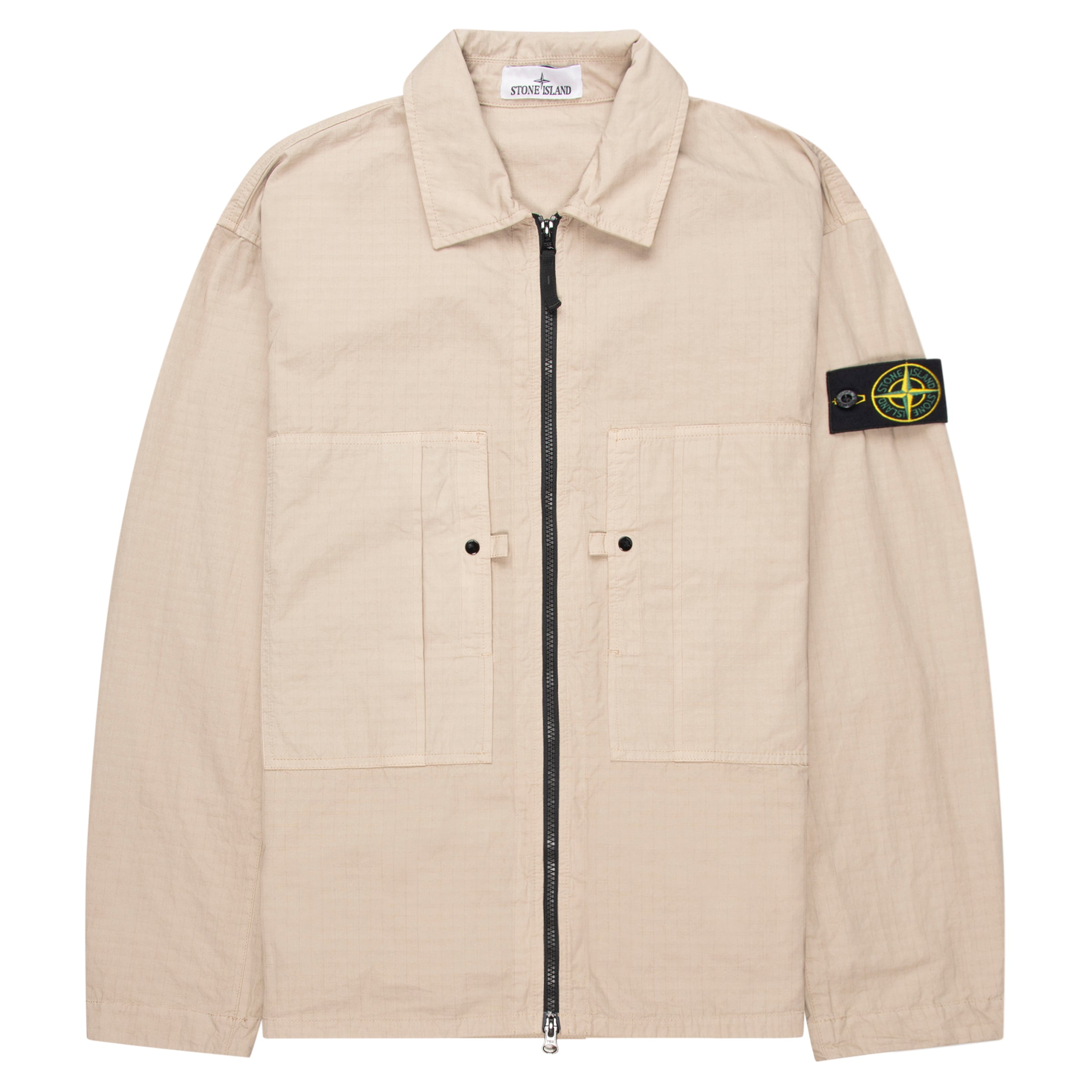 Beige jacket with a brand logo on the sleeve against a white background