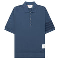 Blue polo shirt with striped sleeves on a white background