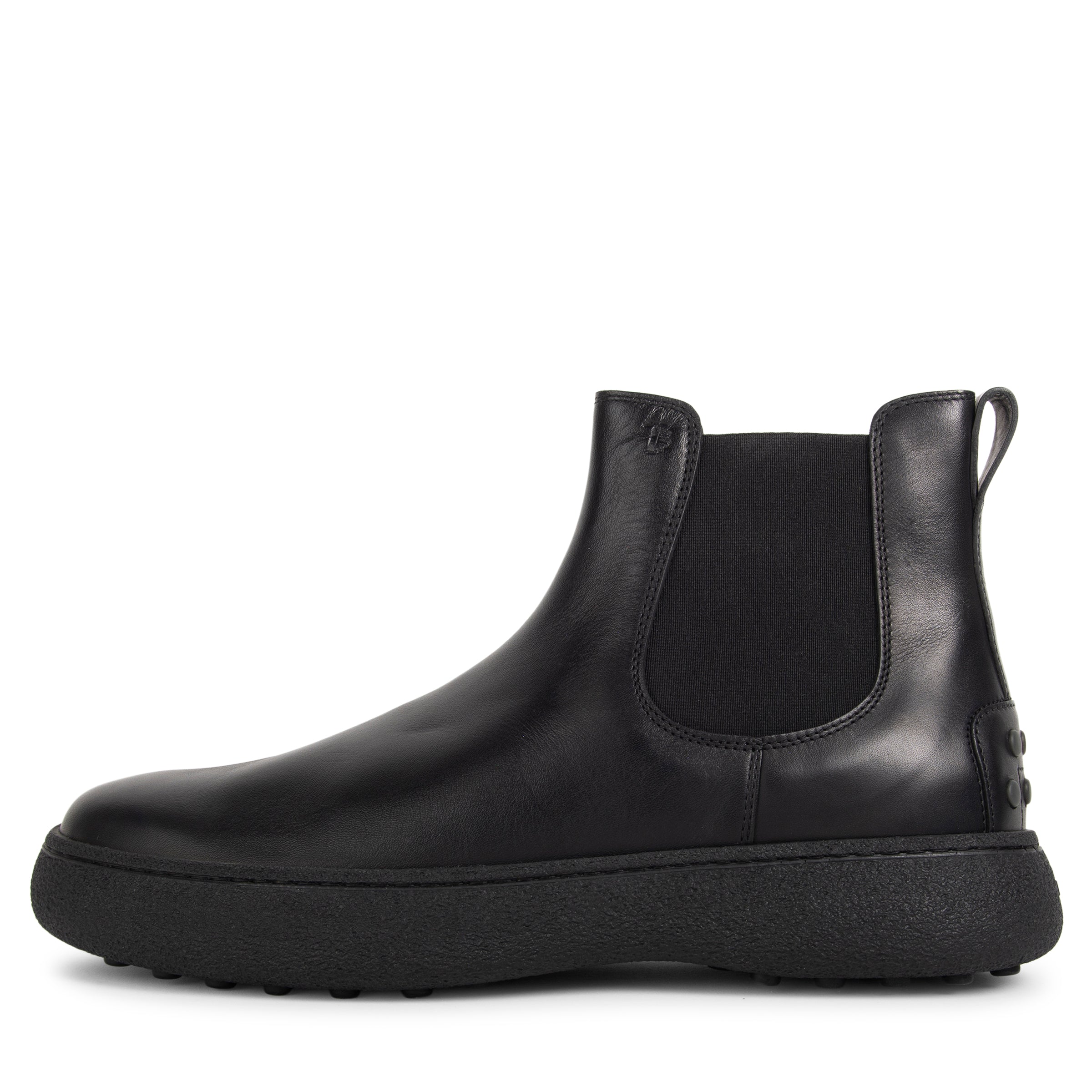 Black Chelsea boot on a white background