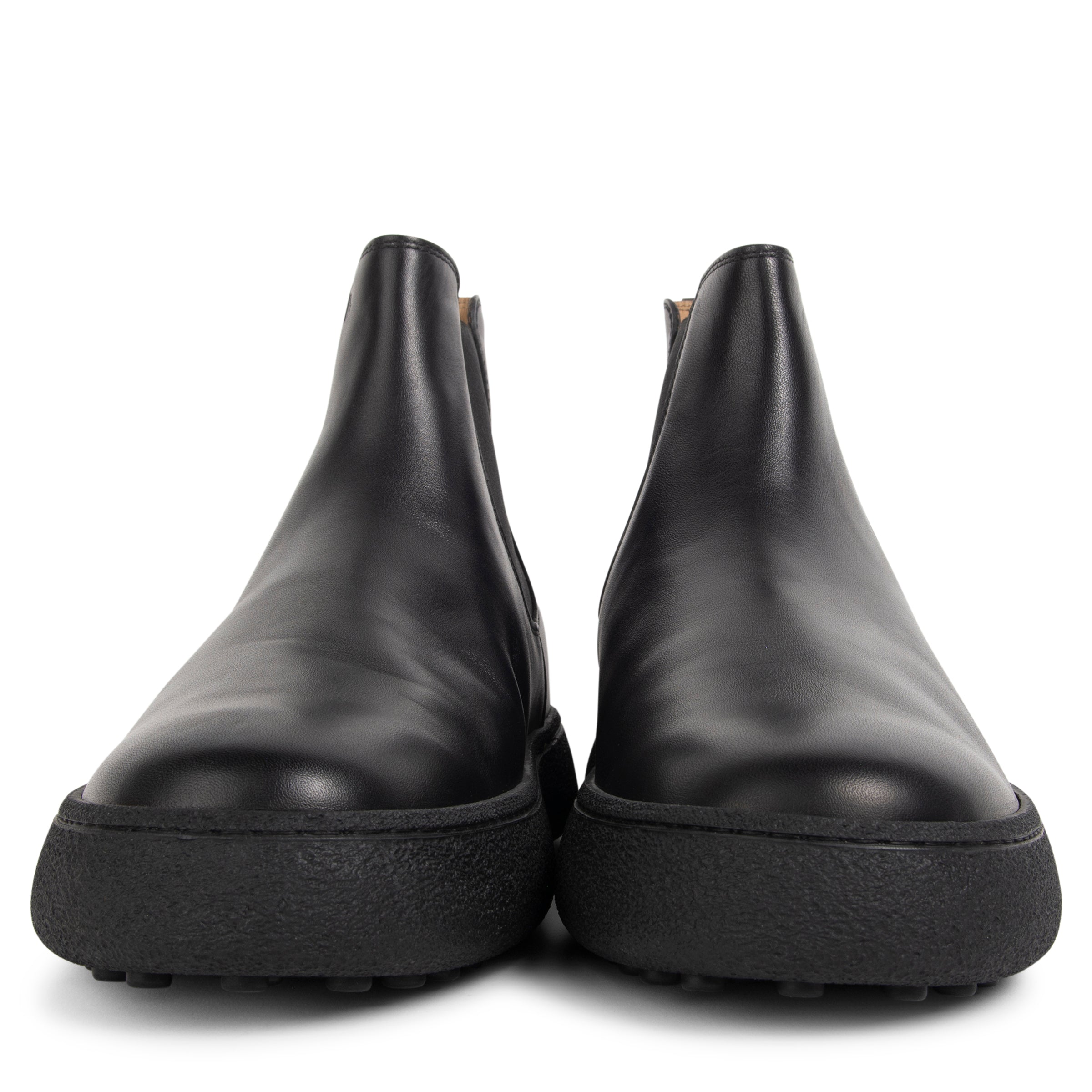 Pair of black leather shoes on a white background