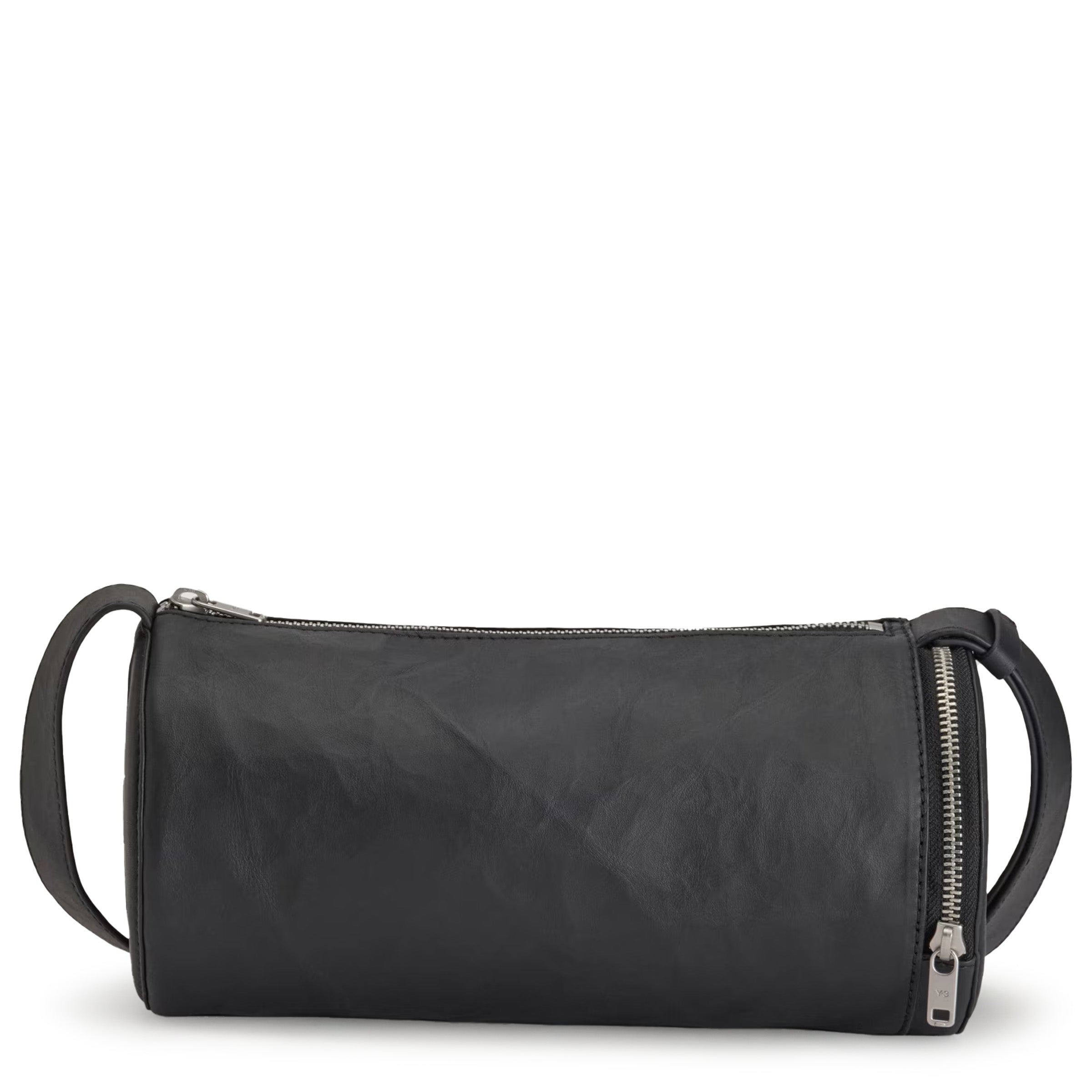 Black leather clutch bag with a strap on a white background
