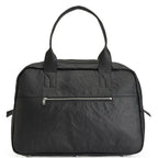 Black textured travel bag with a zipper on a white background
