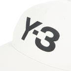 White cap with black 'Y-3' logo on a white background