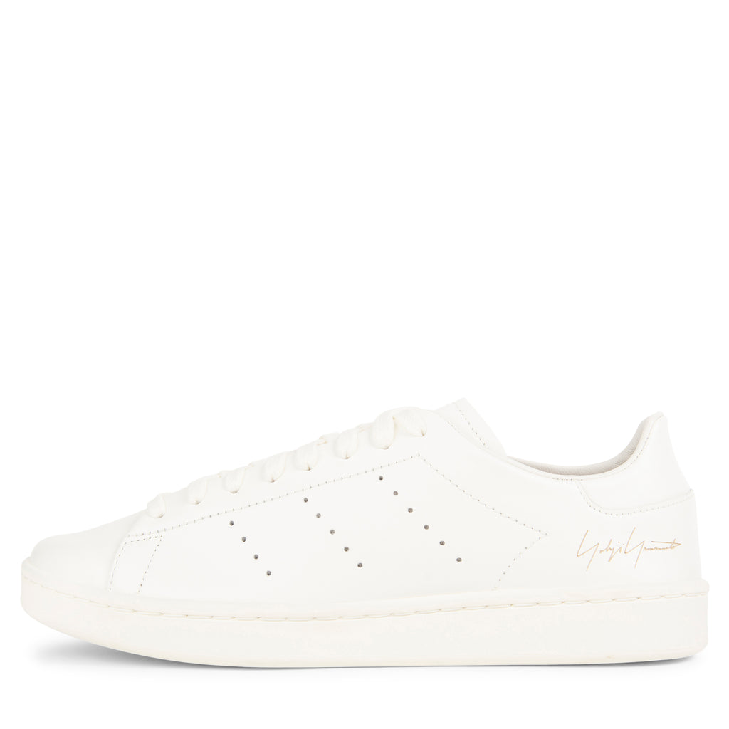Y-3 off white Stan Smith trainers with minimalist leather upper, perforated detailing and clean low-top silhouette