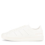 Y-3 off white Stan Smith trainers with minimalist leather upper, perforated detailing and clean low-top silhouette