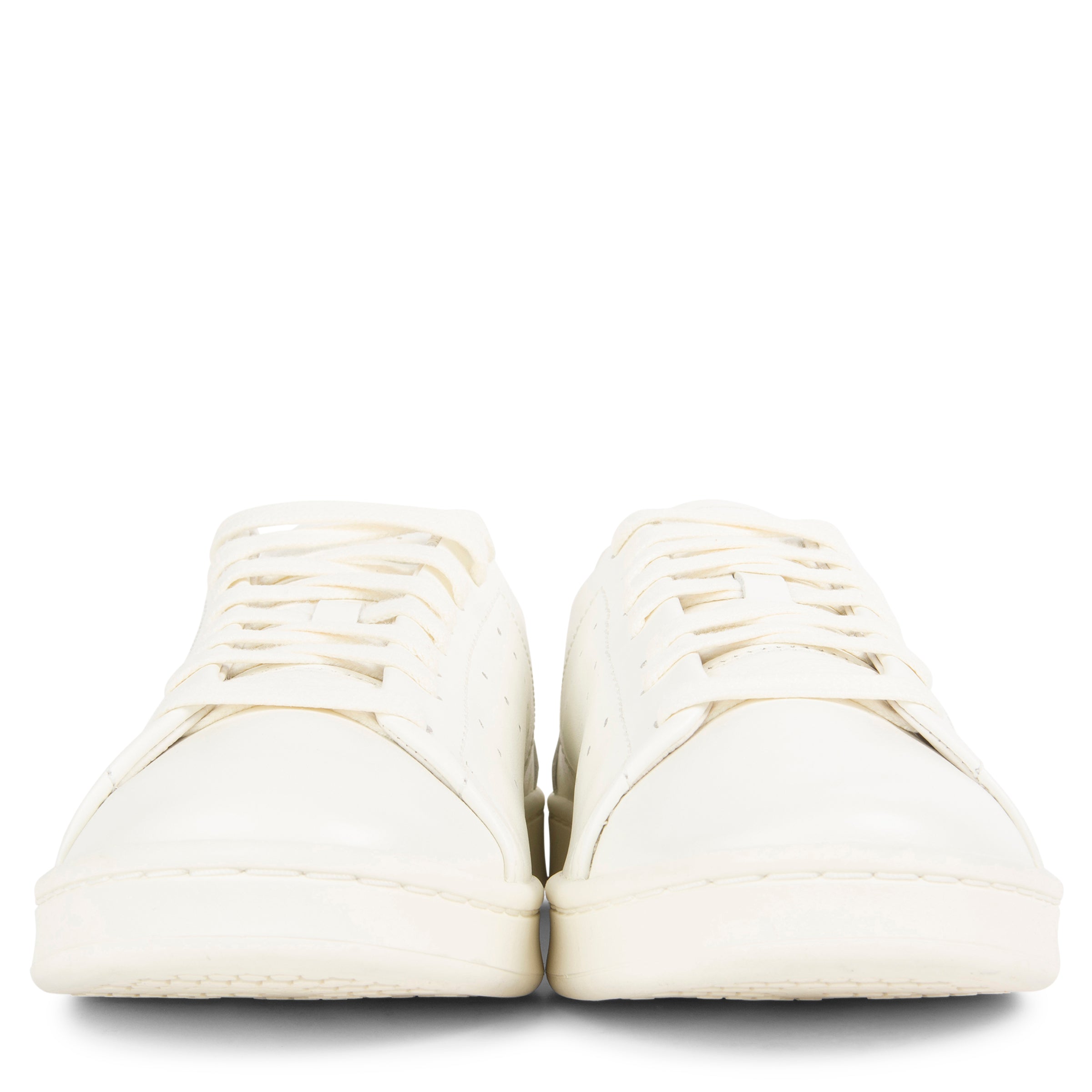 Y-3 off white Stan Smith trainers with minimalist leather upper, perforated detailing and clean low-top silhouette
