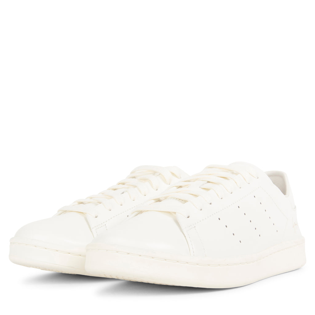 Y-3 off white Stan Smith trainers with minimalist leather upper, perforated detailing and clean low-top silhouette